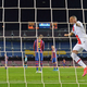 Paris Saint-Germain’s French forward Kylian Mbappe celebrates after scoring one of his three goals against Barcelona.